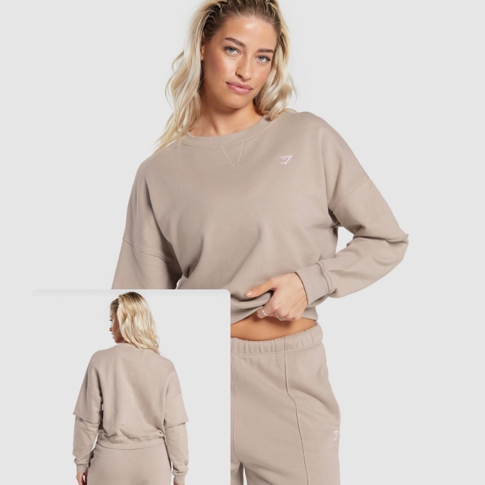 Lifting oversized sweatshirt